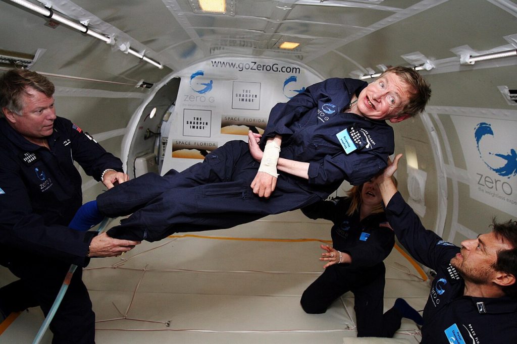 Stephen Hawking (center) enjoys zero gravity during a flight aboard a modified Boeing 727 aircraft owned by Zero Gravity Corp. NASA