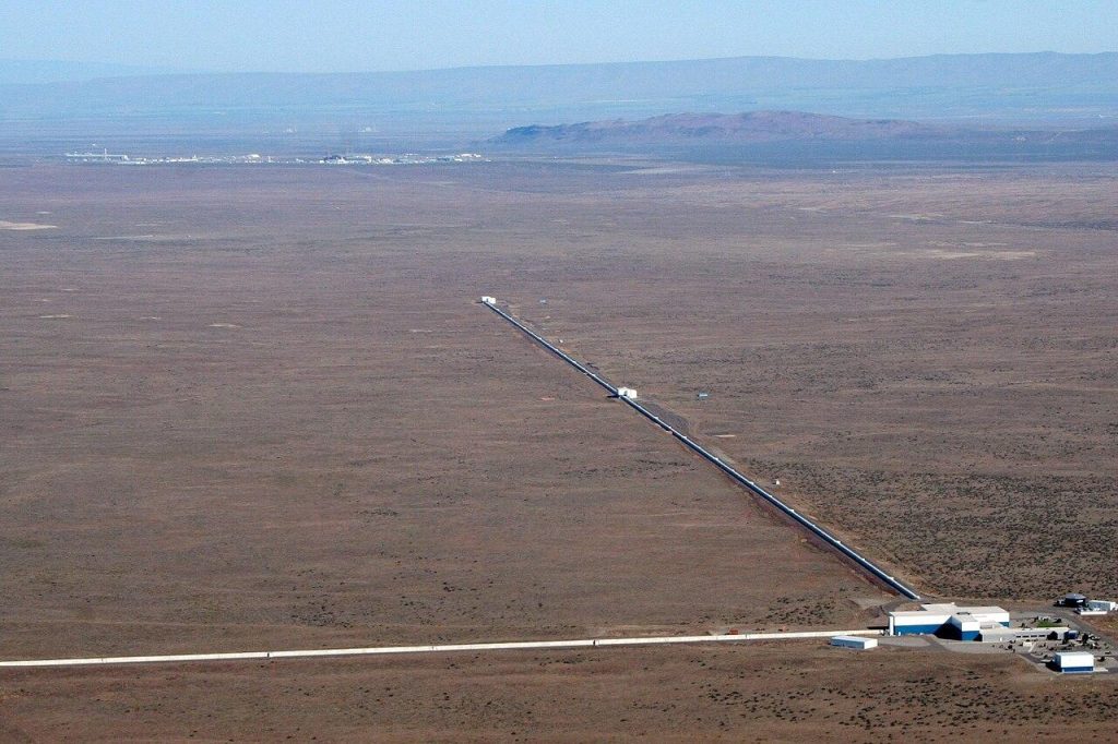 One arm of LIGO Hanford, four kilometres long, with a second running perpendicular off frame.